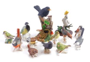 A collection of bird ceramic ornaments, comprising nine Goebel birds, a Beswick gold crest, Karl Enz