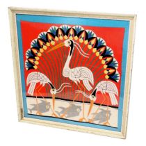 An Egyptian applique wall hanging, decorated with three storks, peacock feathers, fish, etc., framed