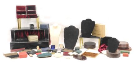 A large quantity of empty jewellery boxes, jewellery display shelves and stepped level.