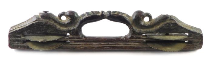 An Indian Kartal musical instrument, with three bronze bells or symbols, carved with birds, 28cm lon