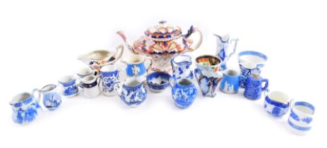 A group of early 20thC ceramics, comprising blue and white cream jugs, Wedgwood cream jug, Gourdy We