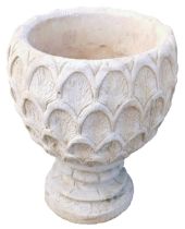 A reconstituted stone pineapple urn deep planter, pineapple pattern, on a circular base, 47cm high.