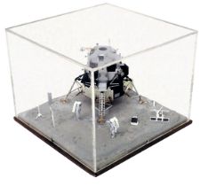 A model of the Apollo Lunar Module Eagle, in perspex and wooden case, 27cm wide.
