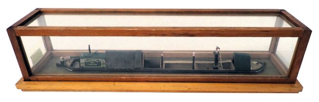 A scale model of a 19thC canal narrow boat, polychrome decorated, in pine, teak and perspex case, 78