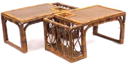 A pair of early 20thC bamboo and rattan occasional tables, 28cm high, 62cm wide, 32cm deep.