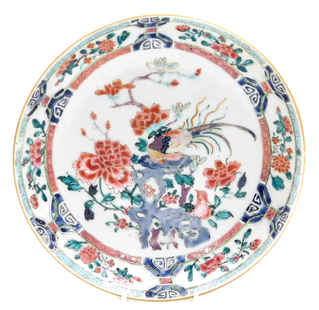A late 18thC Qing dynasty famille rose porcelain saucer dish, painted with peonies and Chinese pheas