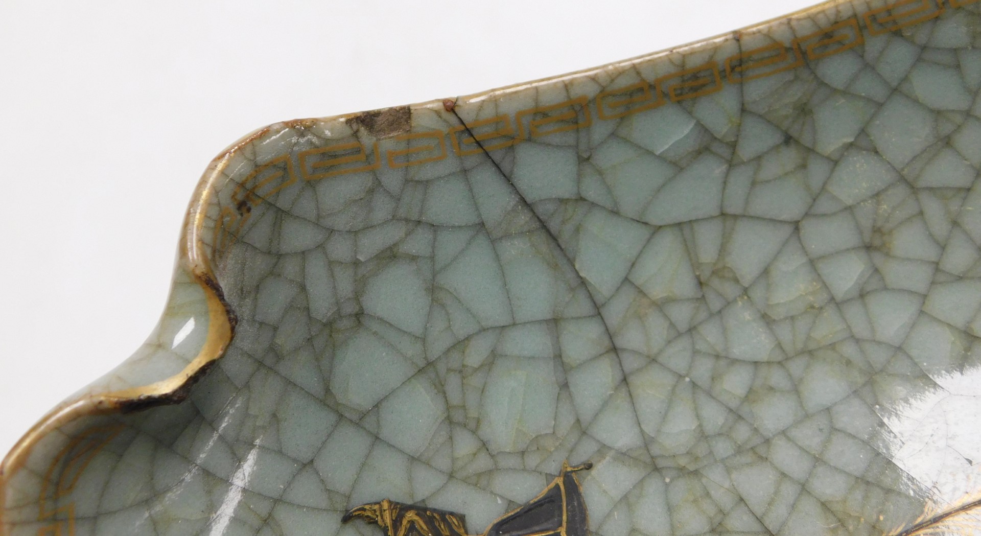 An early 20thC Chinese ge-type dish, of curved, square form, over painted with a vase of peacock fea - Image 7 of 7