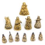 A group of early 20thC Chinese brass figures of deities, 2cm and 3cm high respectively. (10)