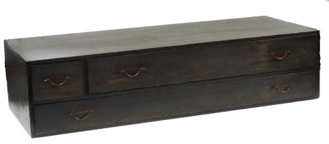 A Japanese softwood sword chest, of rectangular section, one short and two long drawers, 27.5cm high