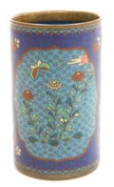 A Meiji period cloisonne enamel brush pot, of cylindrical form, decorated with turquoise reserves of