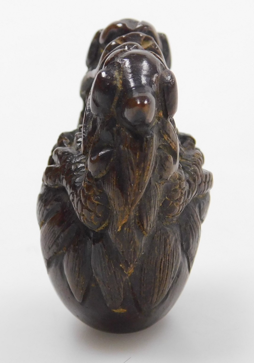 A contemporary Japanese style hardwood netsuke, carved as two dragons embraced over a bell signed, 4 - Image 2 of 6