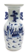 A 19thC Qing dynasty blue and white vase, celadon ground, of twin handled form, decorated with figur