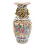 A 19thC Qing dynasty Cantonese famille rose porcelain vase, of baluster form, moulded to the shoulde