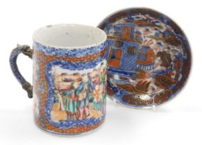 A Qianlong famille rose porcelain tankard, with a dragon handle, painted with reserves of figures in