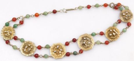 A 20thC Chinese gilt metal, jade and red hardstone necklace, formed as six octagonal links, with var