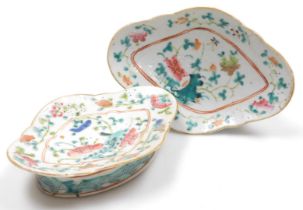 A pair of Tonghzi famille rose porcelain dishes, of oval footed form, decorated with flowers, extern
