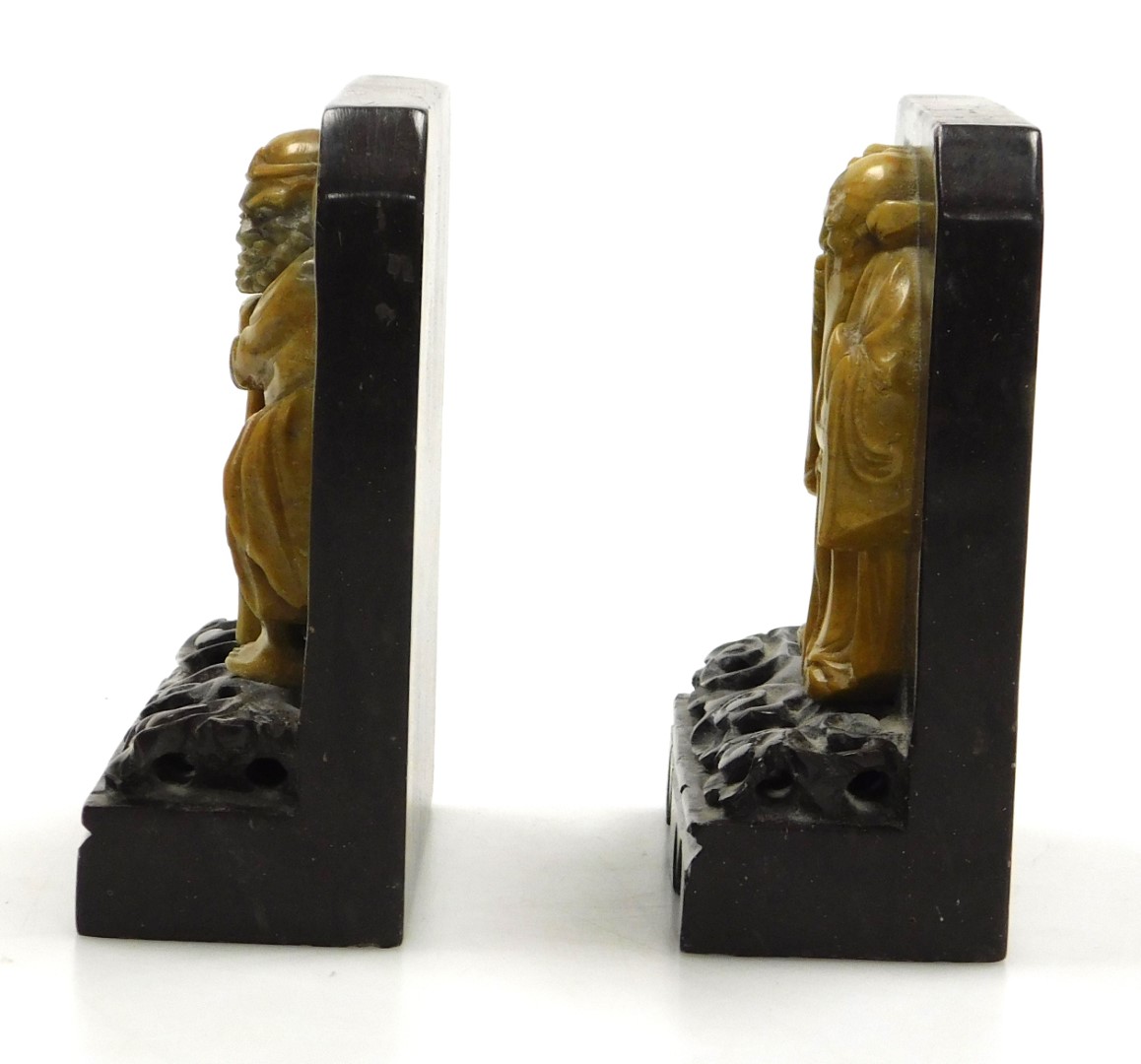 A pair of late 19thC Qing dynasty soapstone bookends, carved with immortals on a cloud ground, and c - Image 3 of 6