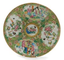A 19thC Qing dynasty Cantonese famille rose porcelain plate, decorated with reserved of figures in a