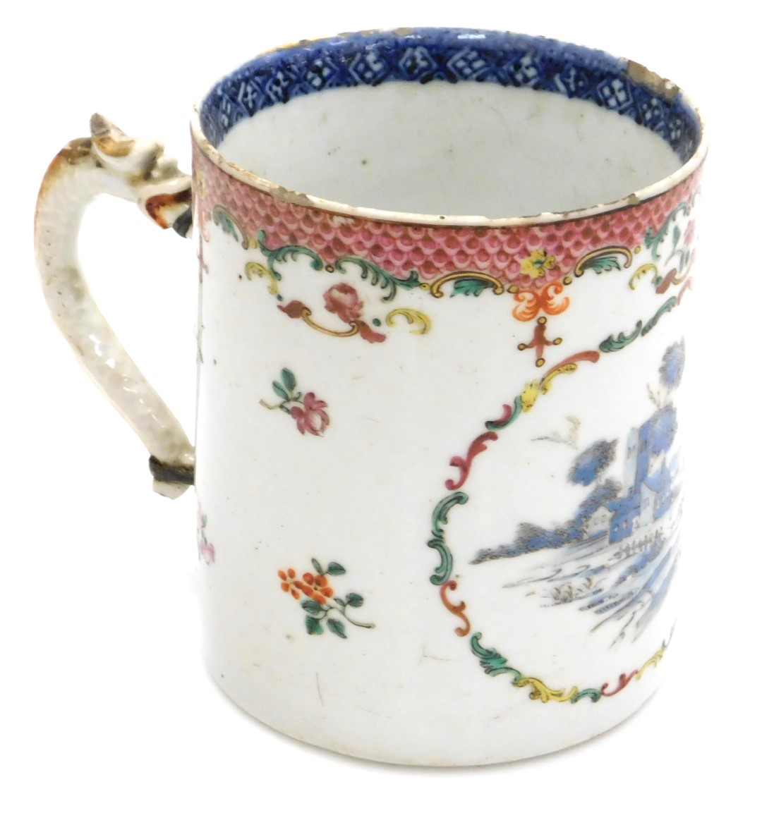 A late 18thC Qing dynasty export porcelain tankard, with a dragon handle, decorated in shades of blu