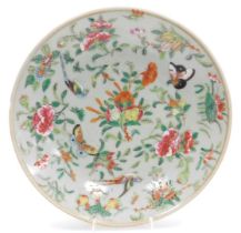 A 19thC Qing dynasty Cantonese famille rose porcelain plate, decorated with birds, fruit, butterflie