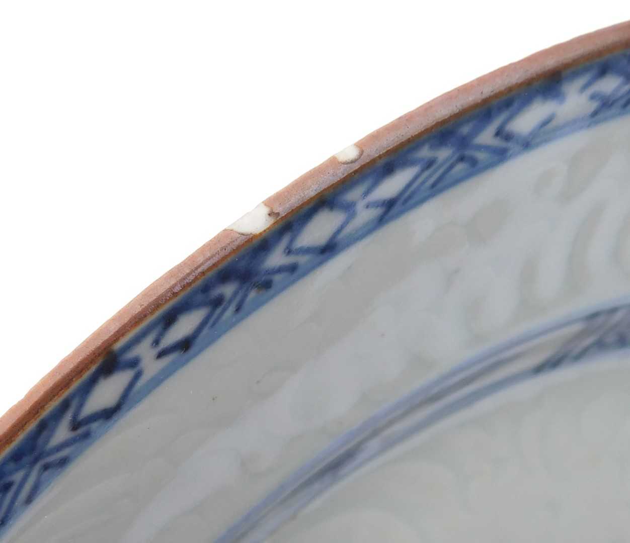 An 18thC Qing dynasty blue and white plate, an hua decorated with stylised flowers, within hatched b - Image 4 of 4