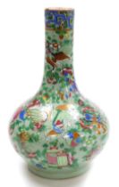 A 19thC Qing dynasty famille rose celadon porcelain vase, of long necked, globular form, decorated a