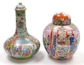 A 19thC Qing Dynasty Cantonese famille rose porcelain bottle vase and cover, decorated with reserves