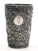 A Hung Chong silver beaker, repousse decorated with dragons chasing a flaming pearl, with a circular