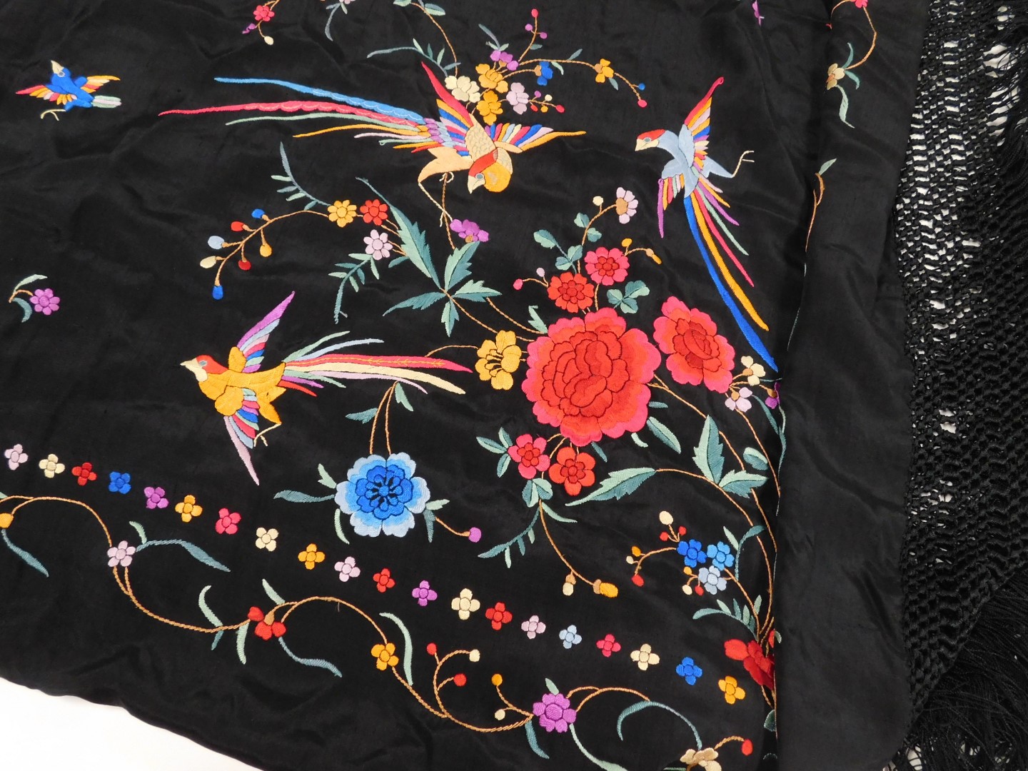 A 20thC Chinese black silk shawl, embroidered with exotic birds, and flowers, with a tassel fringe, - Image 3 of 4