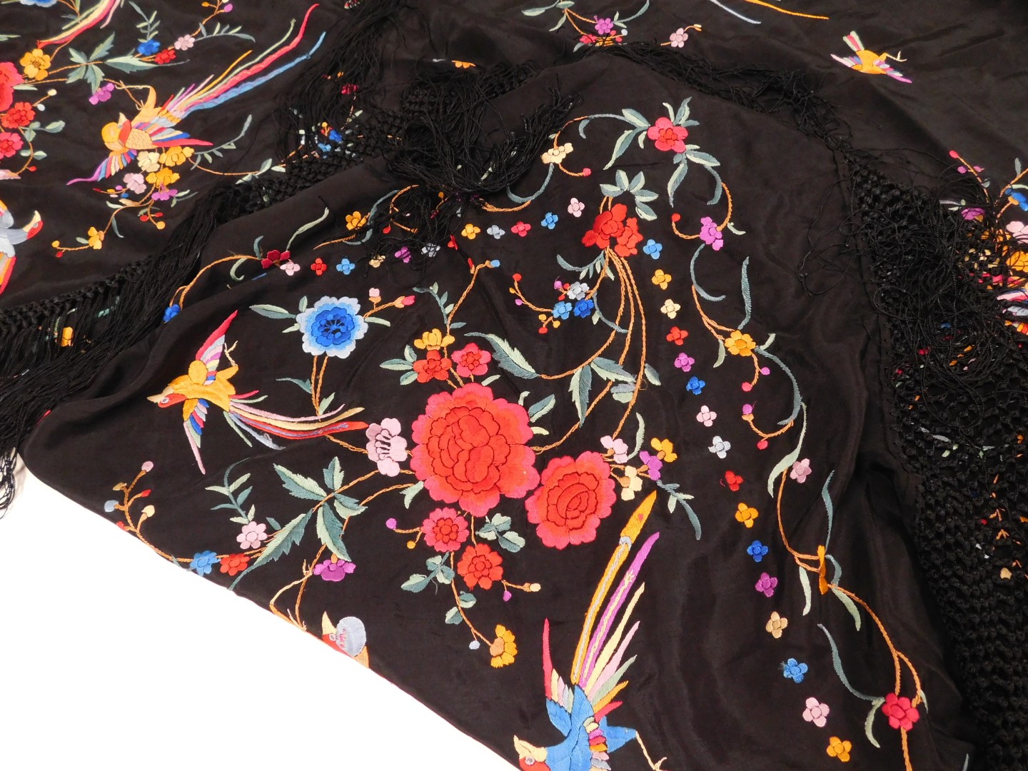 A 20thC Chinese black silk shawl, embroidered with exotic birds, and flowers, with a tassel fringe, - Image 4 of 4
