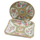 A Qing dynasty Cantonese famille rose porcelain dish, of rectangular form, decorated with reserves o