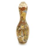 A Meiji period Japanese Satsuma vase, of double gourd form, decorated with vertical panels of figure