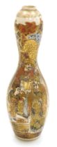 A Meiji period Japanese Satsuma vase, of double gourd form, decorated with vertical panels of figure