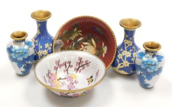 A group of 20thC Chinese cloisonne enamel wares, comprising a pair of blue ground vases decorated wi