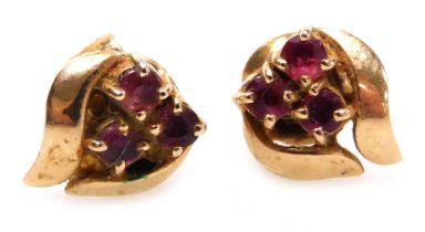 A pair of ruby three stone earrings, set in yellow metal, stamped 14k, 1.6g.