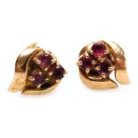 A pair of ruby three stone earrings, set in yellow metal, stamped 14k, 1.6g.