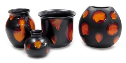 A group of Poole pottery Galaxy wares, comprising three vases, 18cm, 16.5cm and 10cm high, together