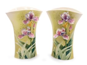 A pair of Franz porcelain Enchanted Garden Collection vases, of compressed, flared form, relief deco