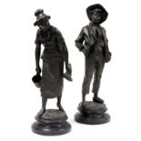 After Henri Weisse (German, 19thC) a pair of spelter figures, modelled as a milkmaid and a boy whist