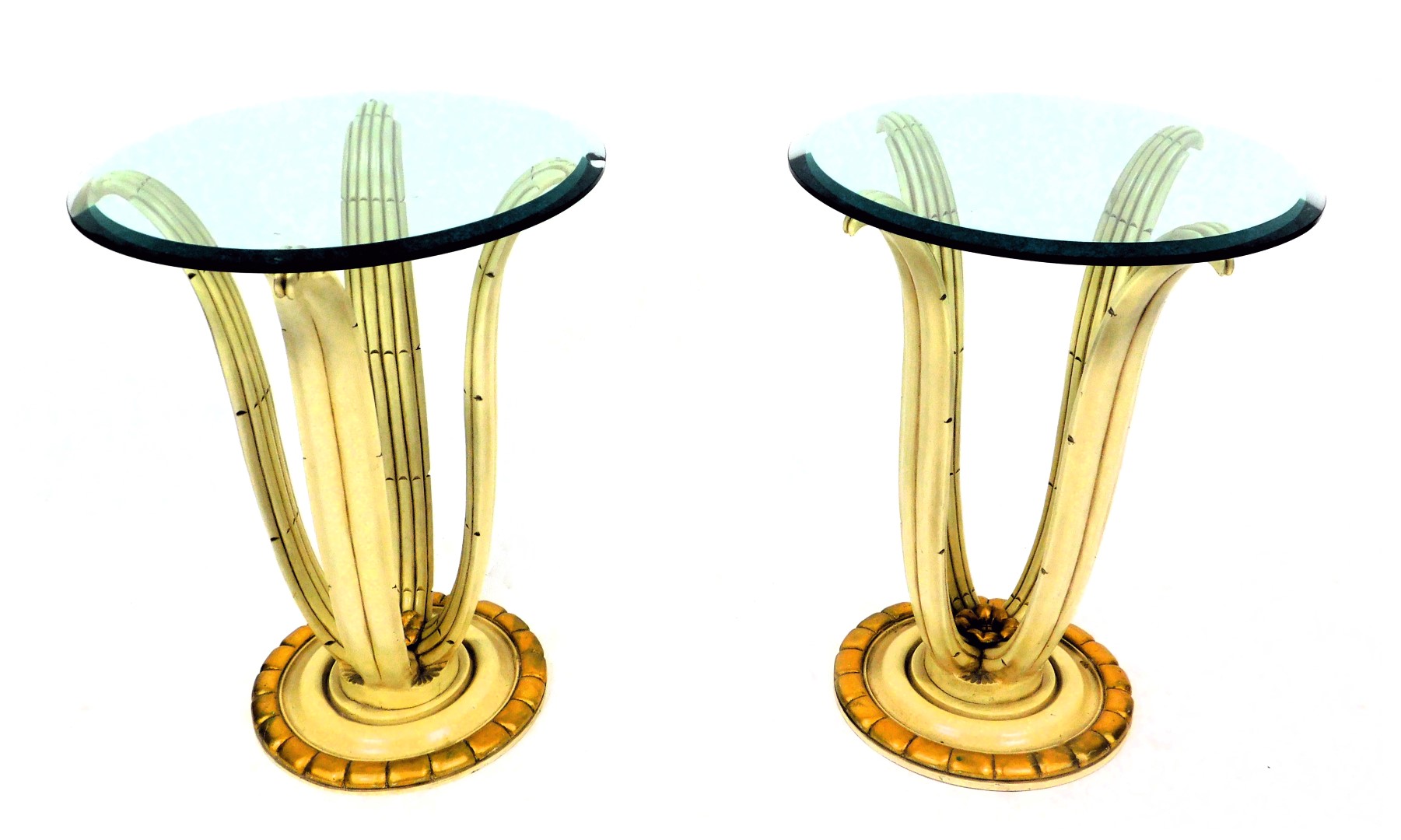 A pair of 1970s Italian Hollywood Regency side tables, with a a circular bevelled glass top, over a