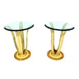 A pair of 1970s Italian Hollywood Regency side tables, with a a circular bevelled glass top, over a