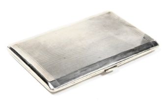 A George VI silver cigarette case, with engine turned decoration, presentation engraved, London 1937