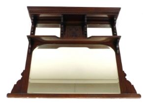 A Victorian mahogany over mantle mirror, the dentil moulded pediment over a pair of rectangular beve