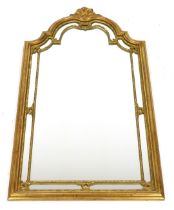 A French 18thC style gilt wood wall mirror, by Ateliers Armand Dutry, of shell capped domed form, 10