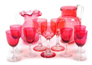 A set of six early 20thC cranberry wine glasses, three flashed wine glasses, and two cranberry glass