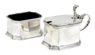A George V silver trencher salt, and mustard pot, with blue glass liners, of octagonal form, Birming