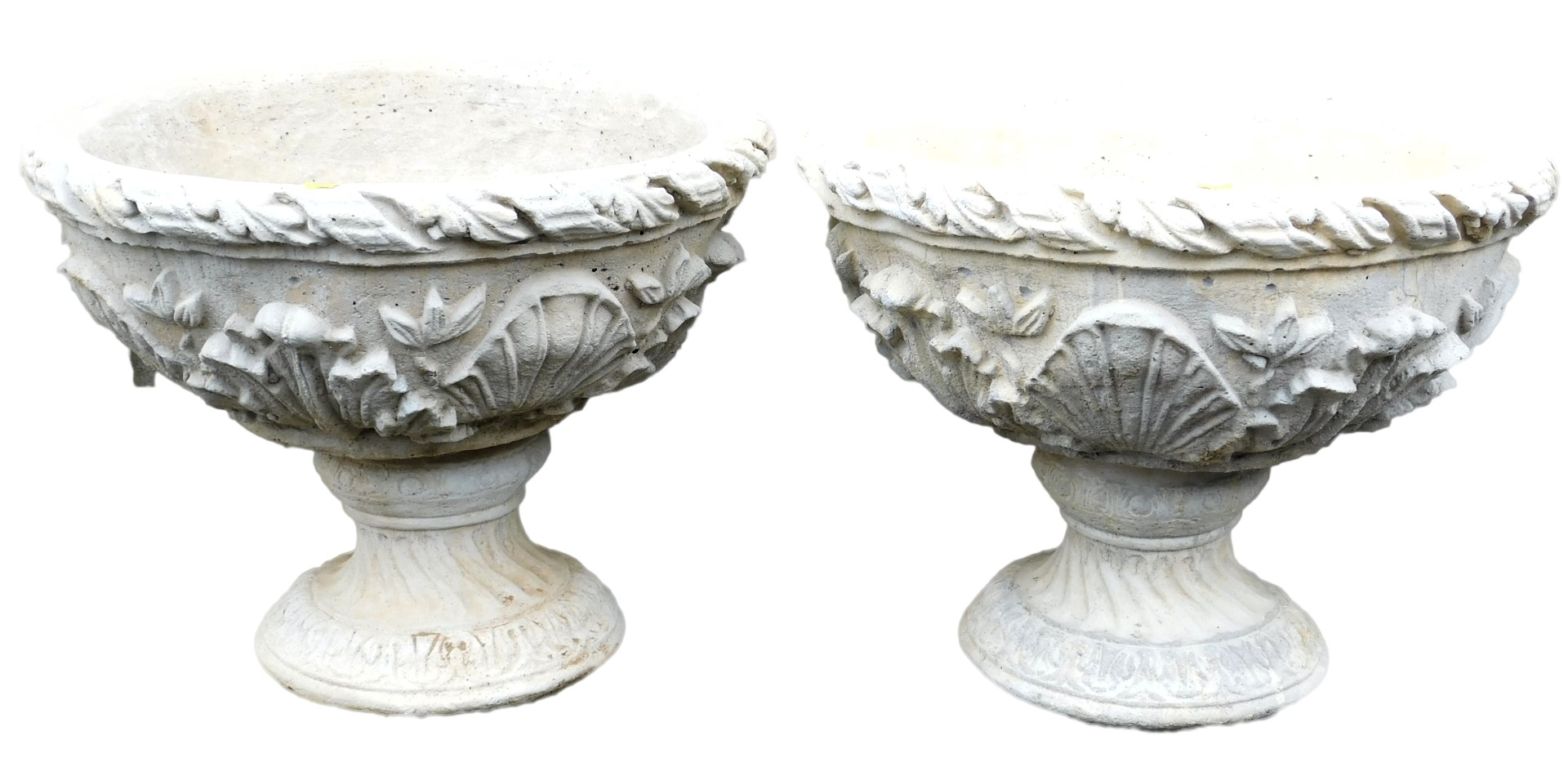 A pair of concrete circular planters, with leaf and shell moulding, 54cm wide.