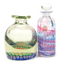 A Victorian cut glass millefiori inkwell paperweight, lacking stopper, 11.5cm high, together with an