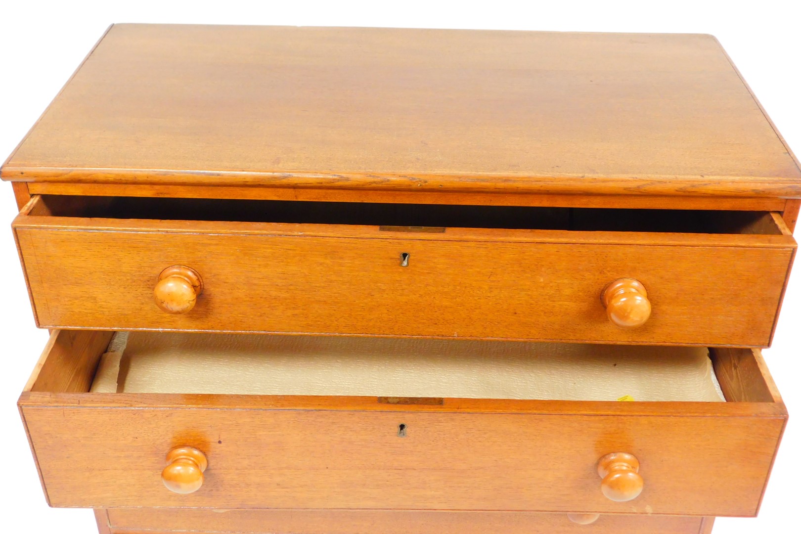 An early 19thC oak chest, of four long graduated drawers, raised on bracket feet, 101cm high, 90.5cm - Image 2 of 2
