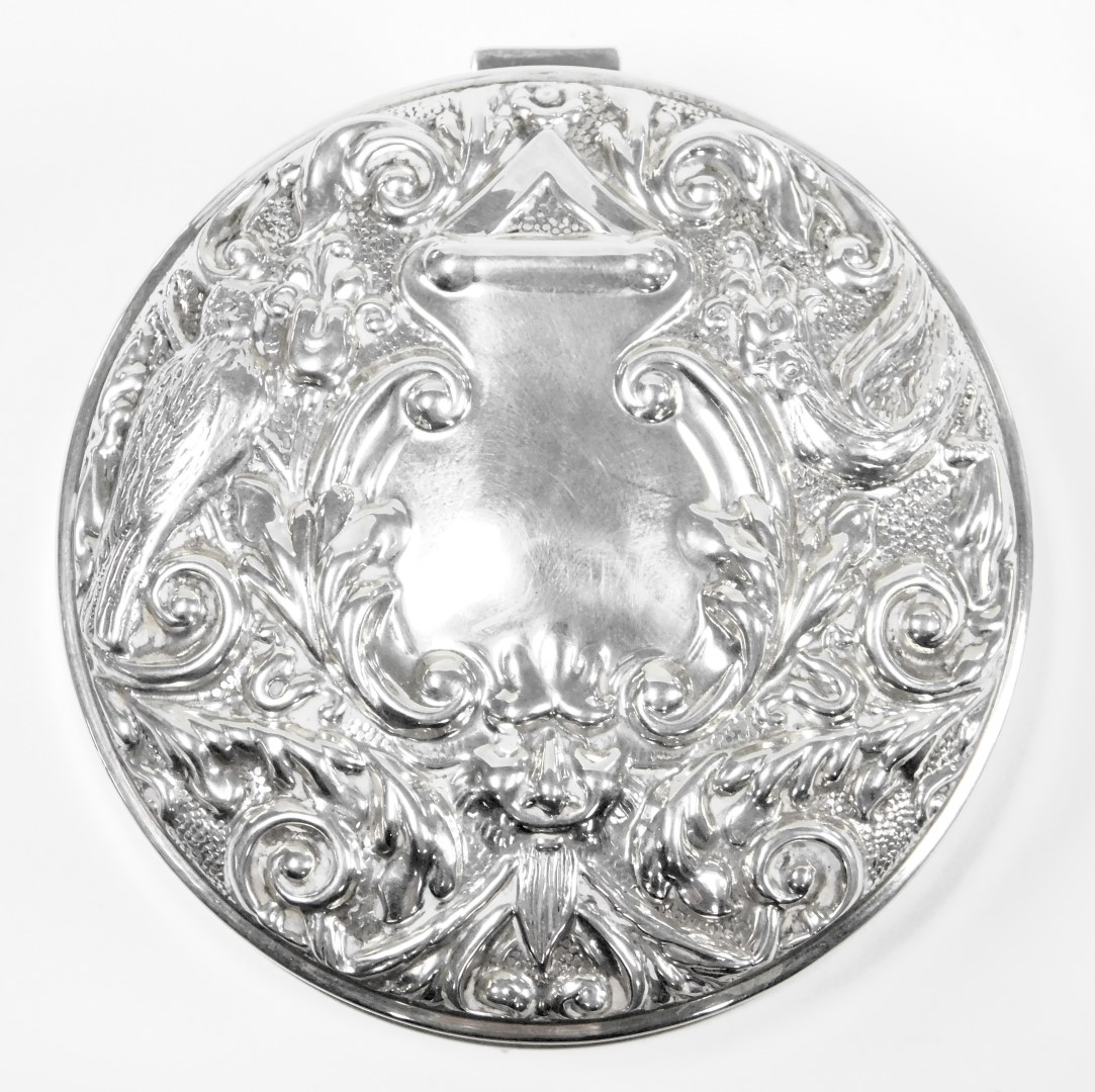 An Elizabeth II loaded silver jewellery box, of circular form, the hinged lid embossed with a mask, - Image 2 of 4